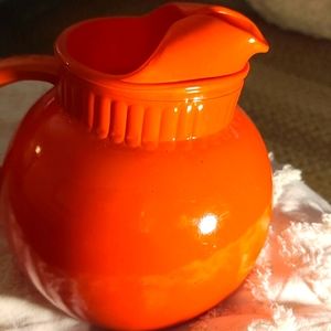 Vintage orange glass ball pitcher